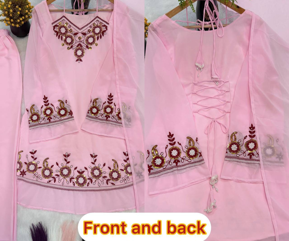 Baby Pink Heavy Faux Georgette Top Palazzo Set - studio flat lay hanger front and back split view showing V-neckline with sunflower mirror embroidery panel, wide sunflower mirror rosette embroidery hem border on top with wine maroon vine leaf scrollwork and gold sequence lace trim, wide palazzo with matching embroidery hem border, and back criss-cross lace-up tie detail with crystal drop