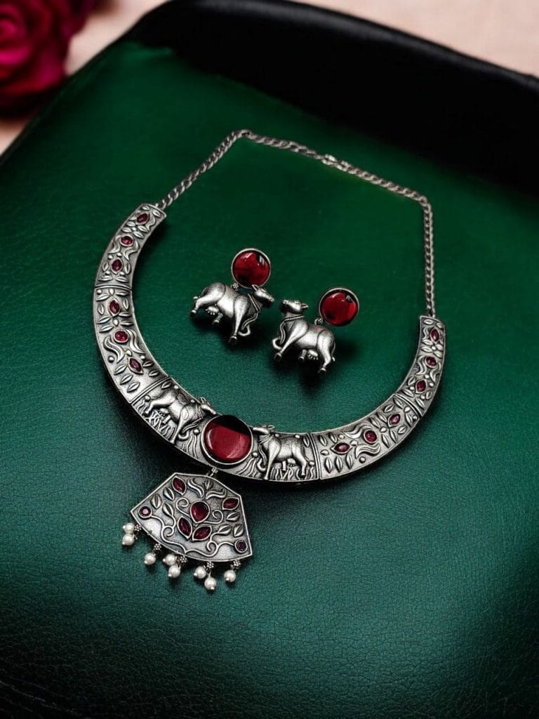 Women's Oxidized Silver Elephant Necklace Set with Red Stone & Earrings - close-up detail view | D9 Creations