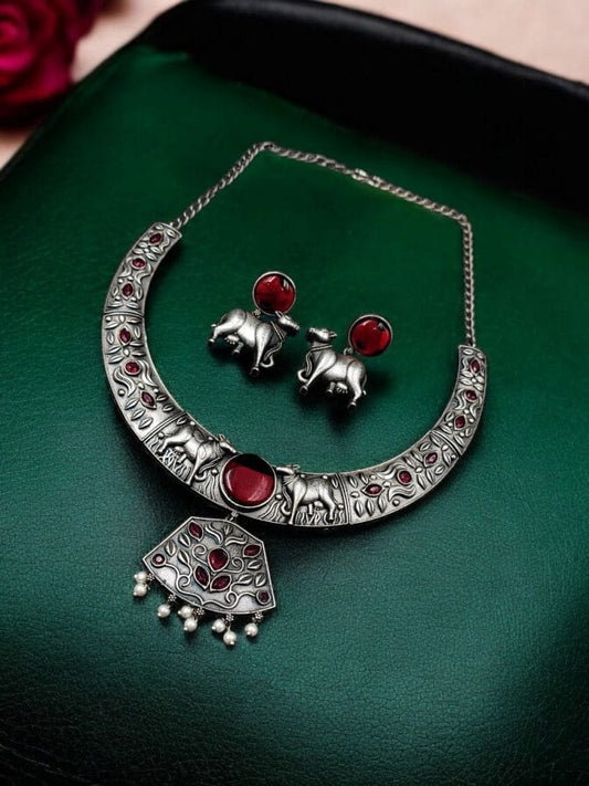 Women's Oxidized Silver Elephant Necklace Set with Red Stone & Earrings - close-up detail view | D9 Creations