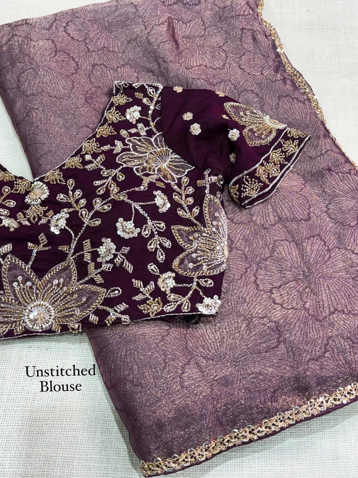 Dusty mauve floral zari jacquard saree with beads lace edging and deep plum beaded floral applique blouse fabric, labelled unstitched blouse.
