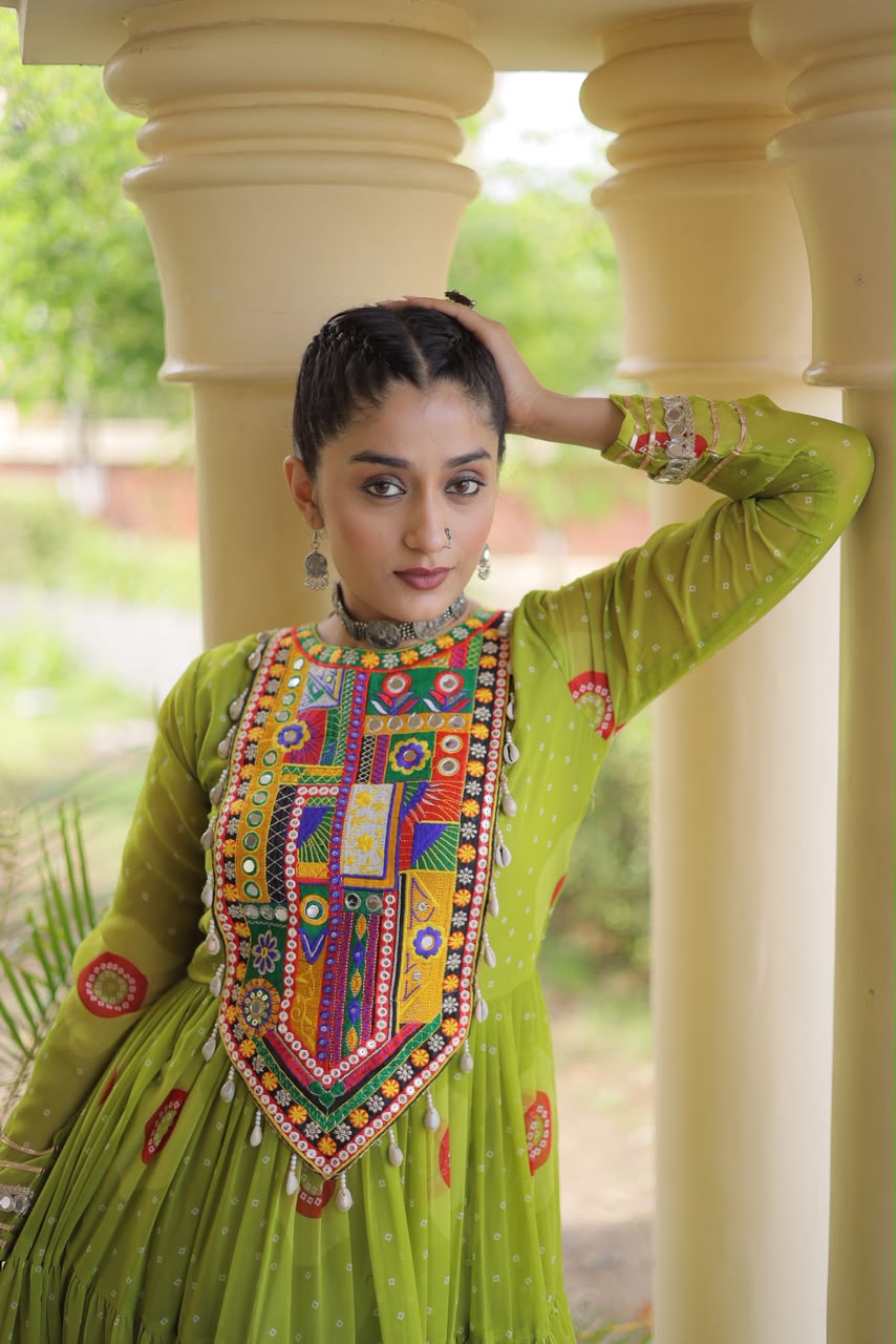 Lime Green Bandhani Faux Georgette Gown - outdoor haveli archway spectacular full twirl view showing complete 12-metre tiered flair spread wide with bandhani print and circular medallion paisley motifs in full radiant flight