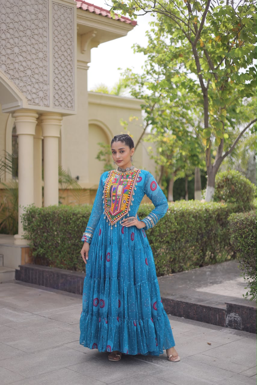 Turquoise Bandhani Faux Georgette Gown - outdoor villa full length twirl view showing spectacular 12-metre flair with bandhani print and circular medallion motifs in full flight