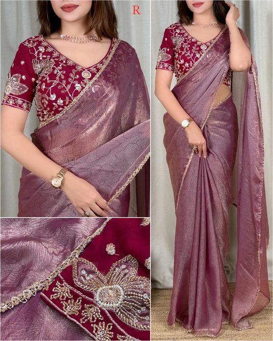 Rose mauve Fandy satin jacquard saree with beads lace border, styled with a wine red floral beaded applique blouse with V neckline and short sleeves.